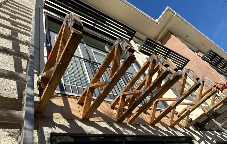 Balcony rebuild during multifamily restoration