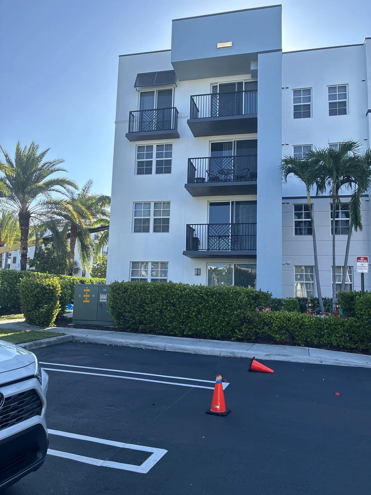 Apartment facade and balcony railings at a Boynton Beach exterior renovation project.