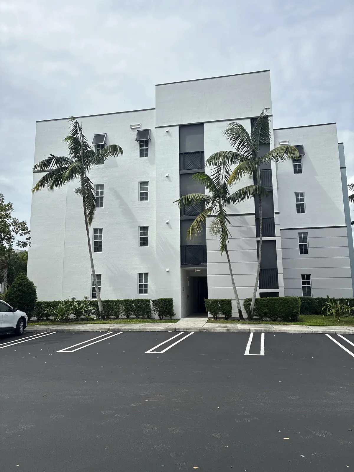 Boynton Beach multifamily exterior showing the previous white and gray paint colors.
